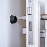 Door Stops – Small 28mm (1.1/8") Black & White Pack of 4 with Fixings – Wall & Skirting Mounted Door Stoppers